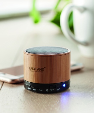 Logotrade advertising product picture of: Round Bamboo wireless speaker