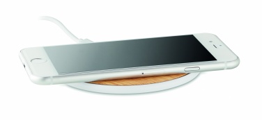 Logotrade reklaamkingituse foto: Juhtmeta laadija ümmargune 5W TISPAD