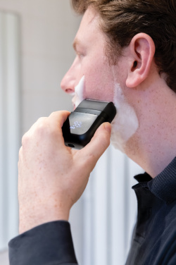 Лого трейд pекламные продукты фото: Аккумуляторная дорожная бритва TrimBlade, степень защиты IPX7.